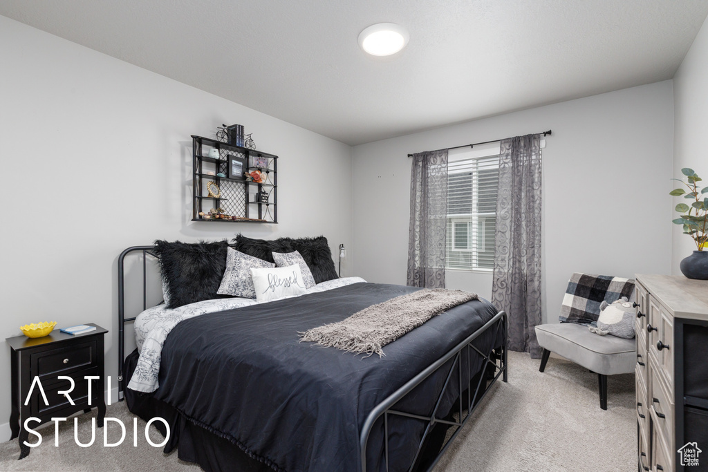View of carpeted bedroom