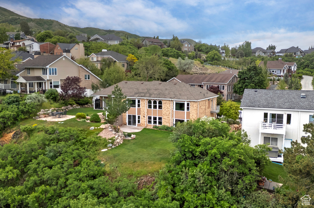 Aerial view of residential area with a mountain backdrop