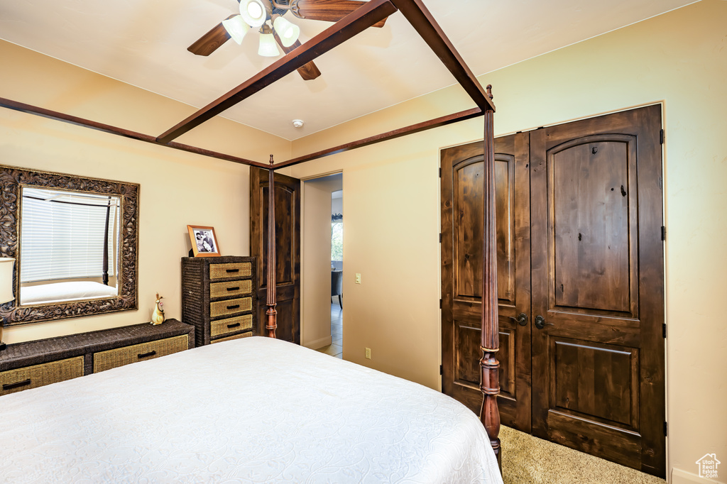 Bedroom featuring carpet and a ceiling fan