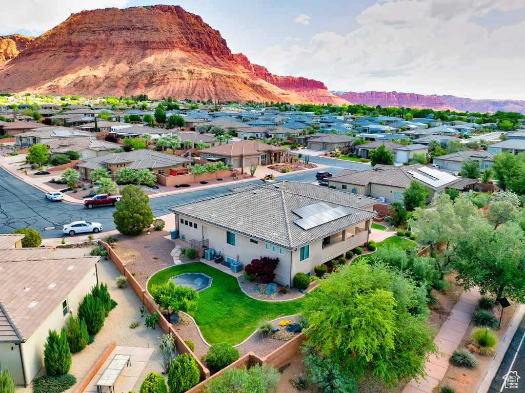 Aerial perspective of suburban area featuring mountains
