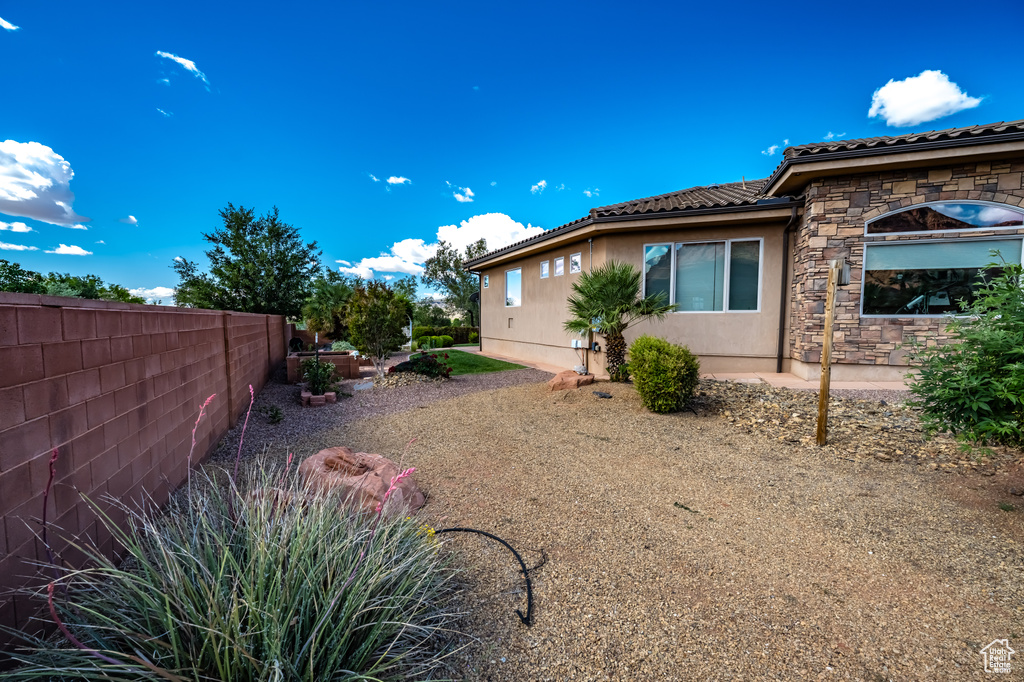 View of yard with fence