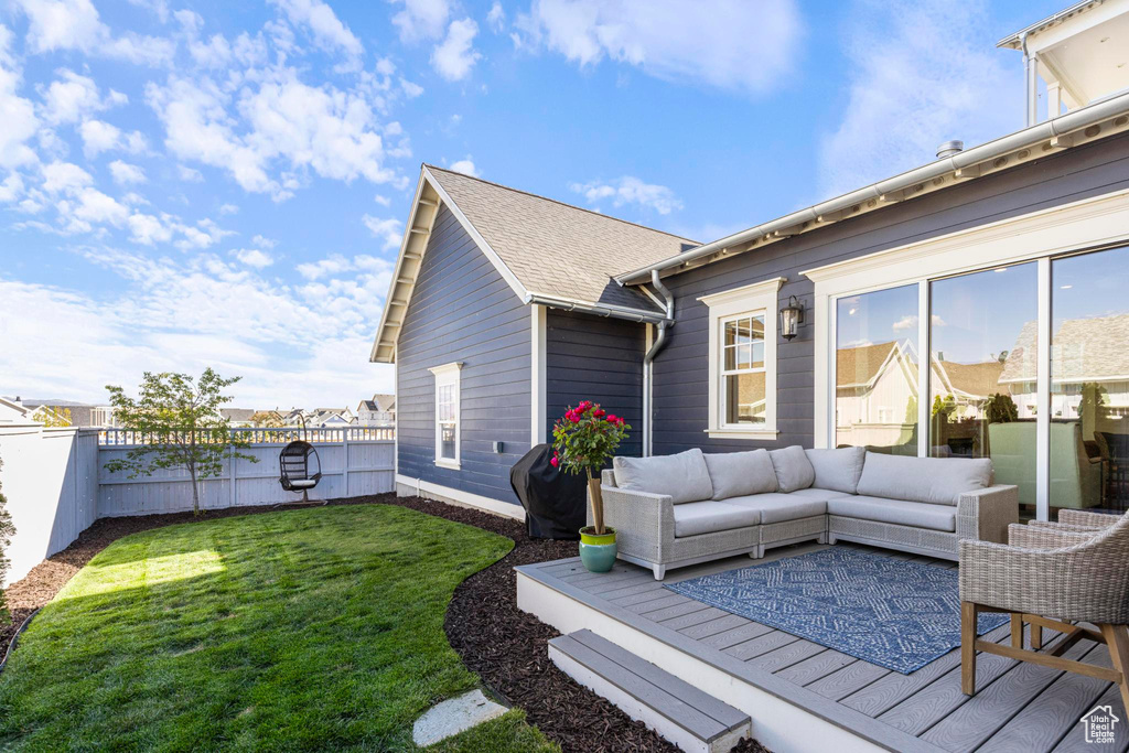 View of side of home with outdoor lounge area