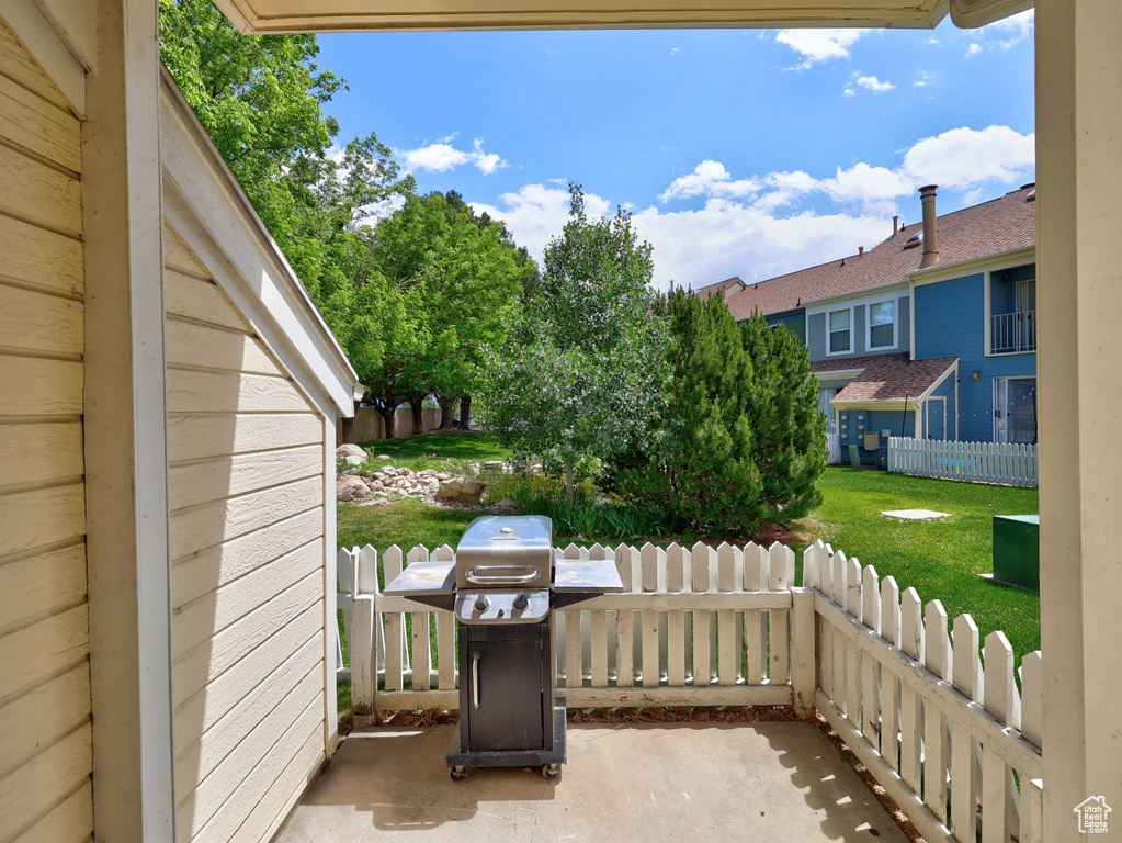 View of patio featuring area for grilling