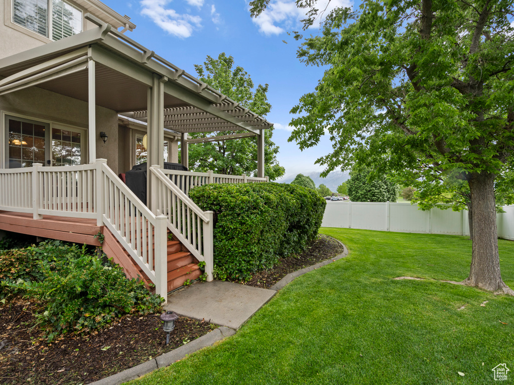 View of yard featuring a pergola