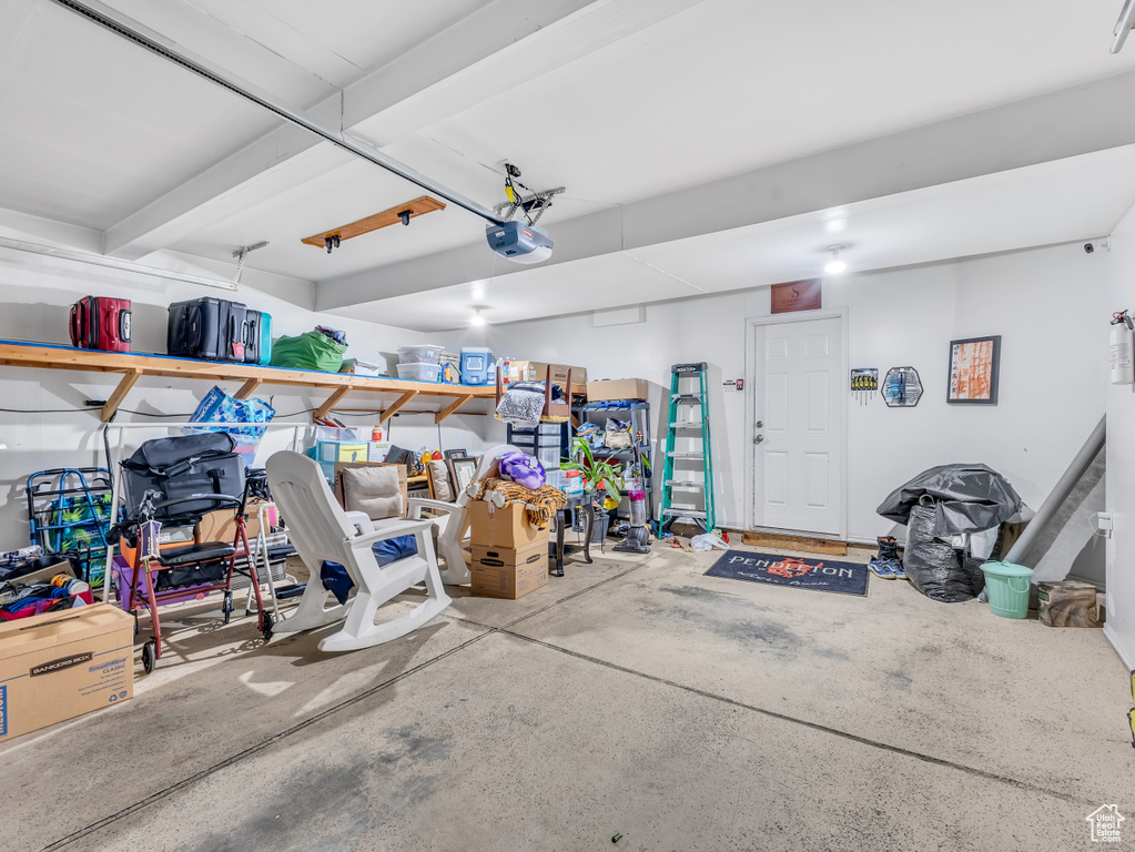Garage featuring a garage door opener