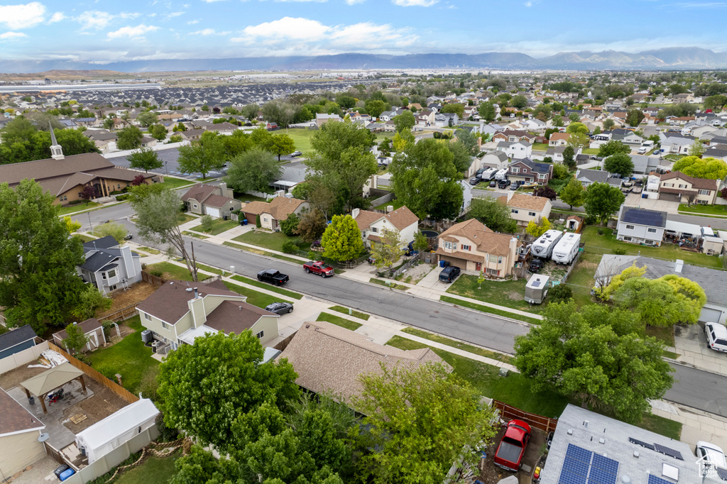 Aerial view of residential area with mountains