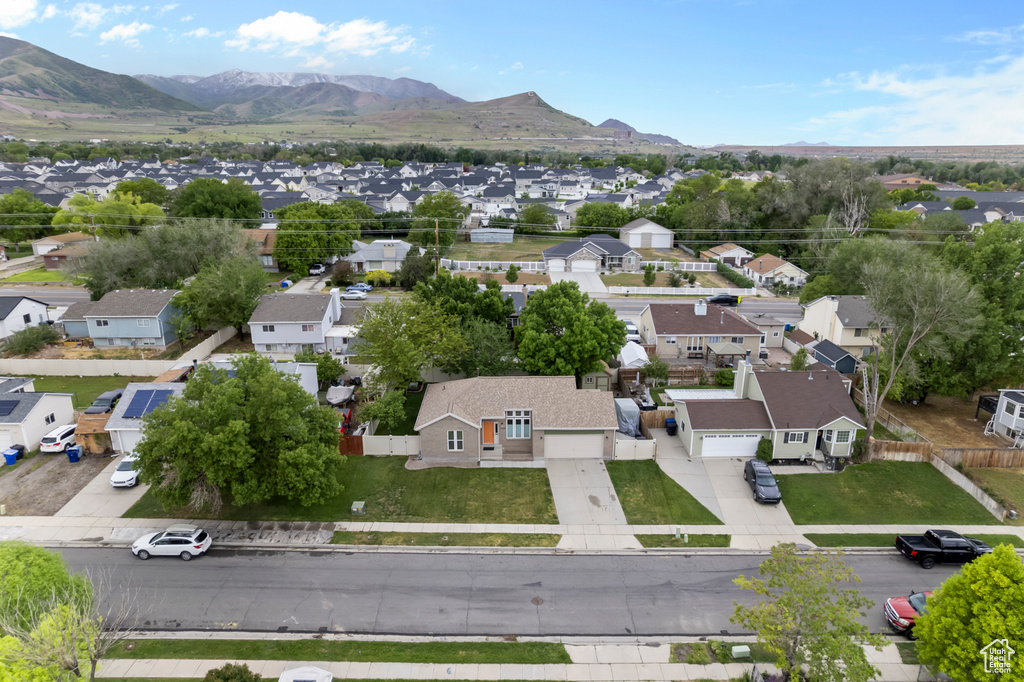 Aerial view of residential area with a mountain backdrop