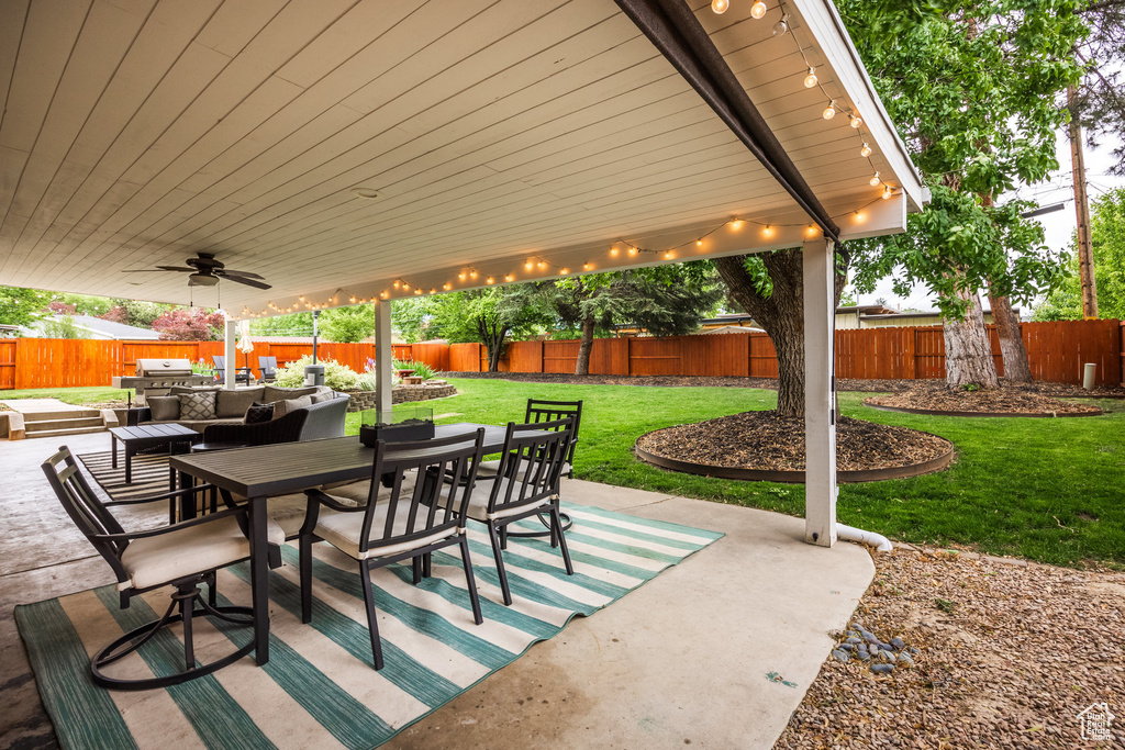 View of patio / terrace featuring outdoor dining space, outdoor lounge area, and a ceiling fan