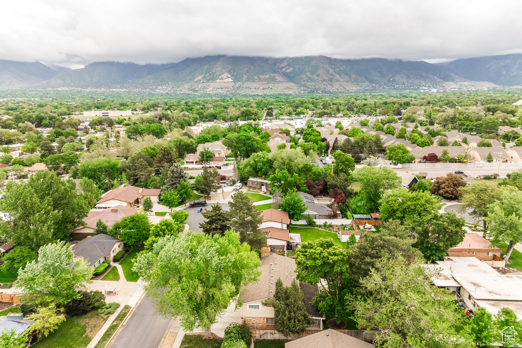 Aerial view of residential area with mountains