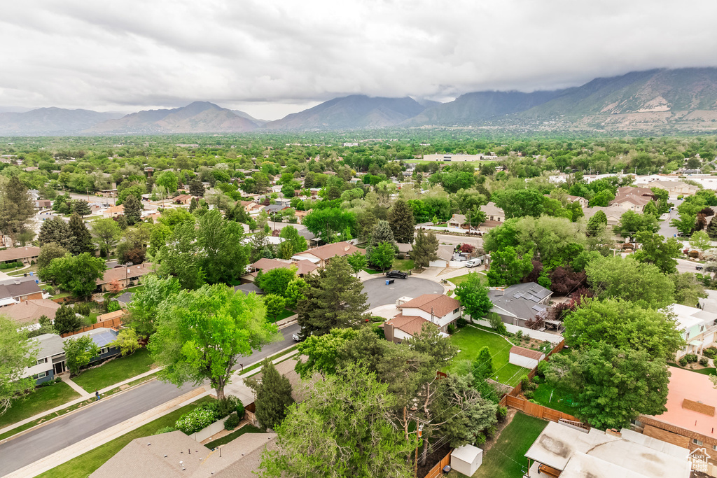 Aerial view of residential area with a mountain backdrop
