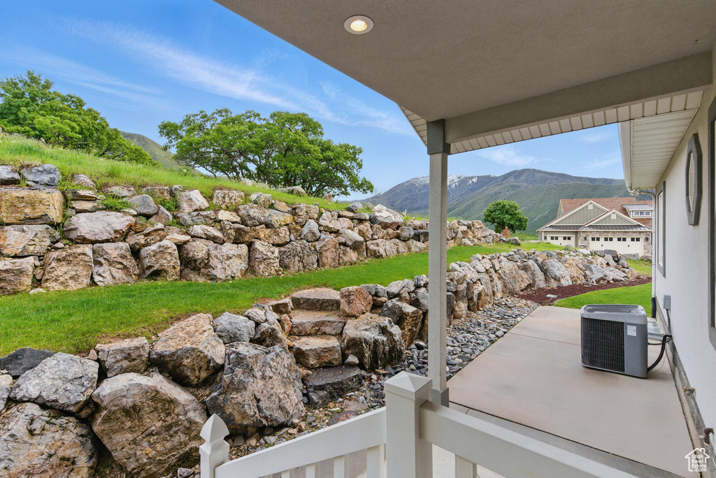 View of patio / terrace with a mountain view and central air condition unit