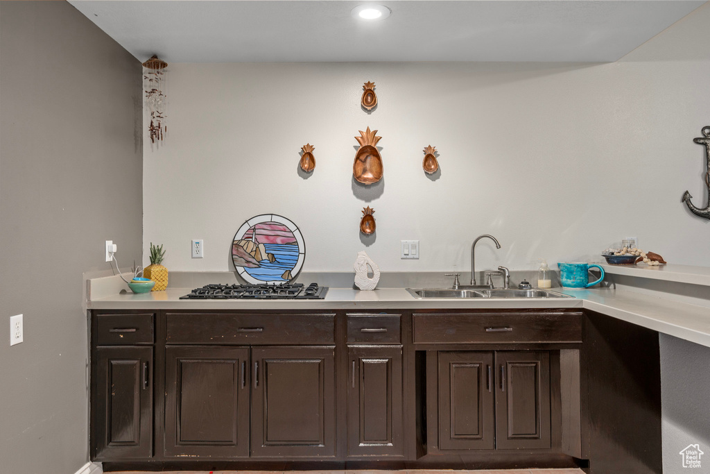 Bathroom featuring a sink and recessed lighting