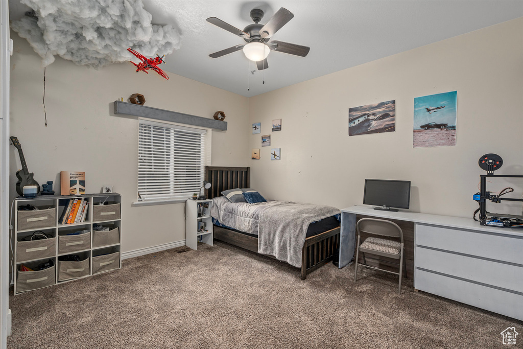 Bedroom with carpet floors and ceiling fan