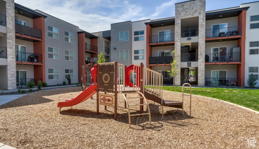 Community playground featuring a residential view