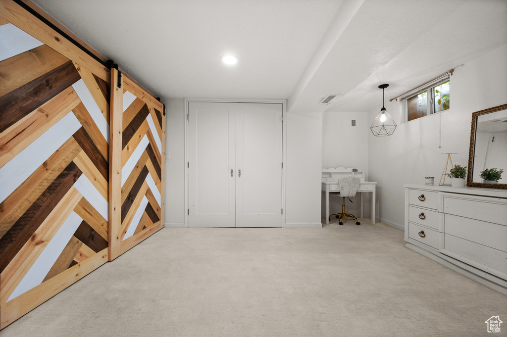 Unfurnished bedroom with carpet floors