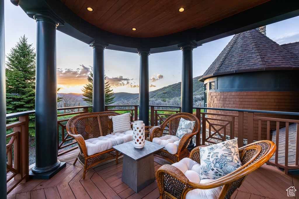 Deck at dusk with a mountain view
