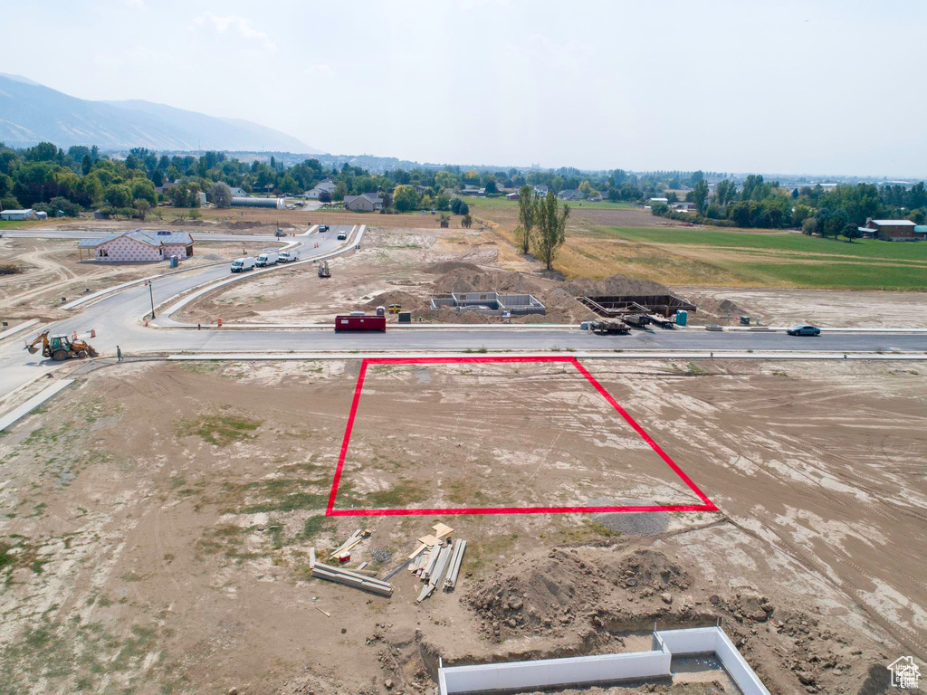 View of property location with property parcel outlined and a mountain backdrop