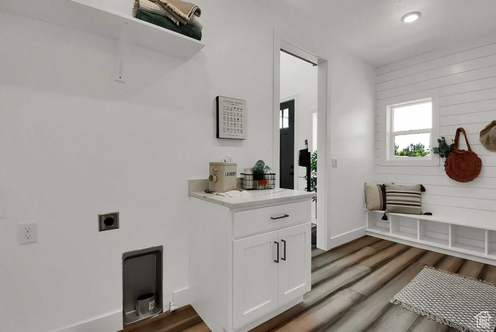 Mudroom with wood finished floors, baseboards, and recessed lighting