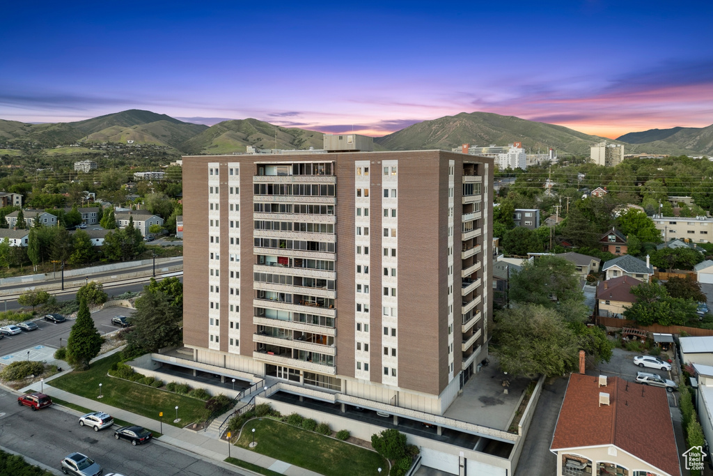 View of building exterior featuring a mountain view