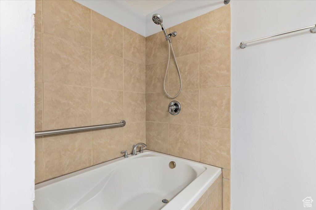 Bathroom featuring shower / bath combination