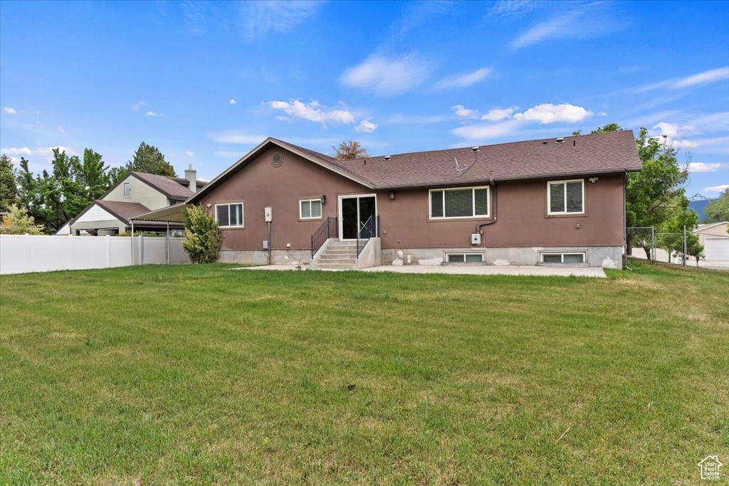 Back of property with entry steps