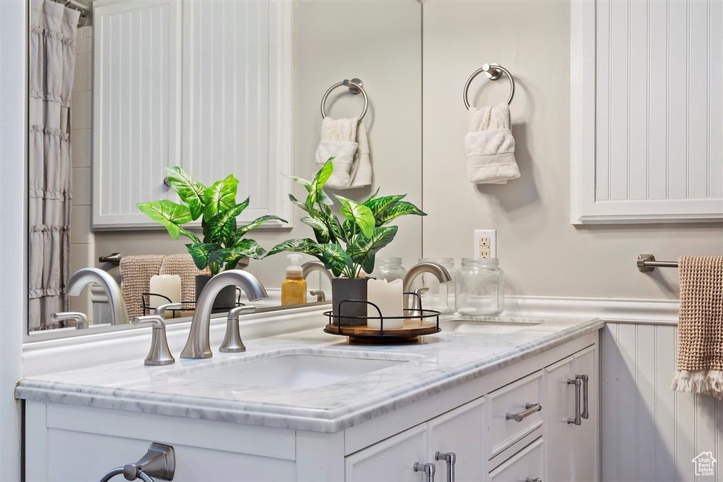 Full bathroom with double vanity