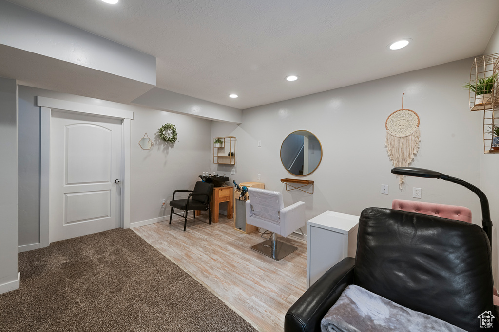 Sitting room featuring recessed lighting, baseboards, and light wood-type flooring