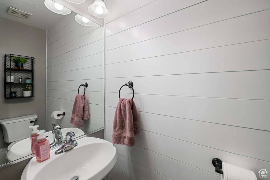 Half bathroom with a sink