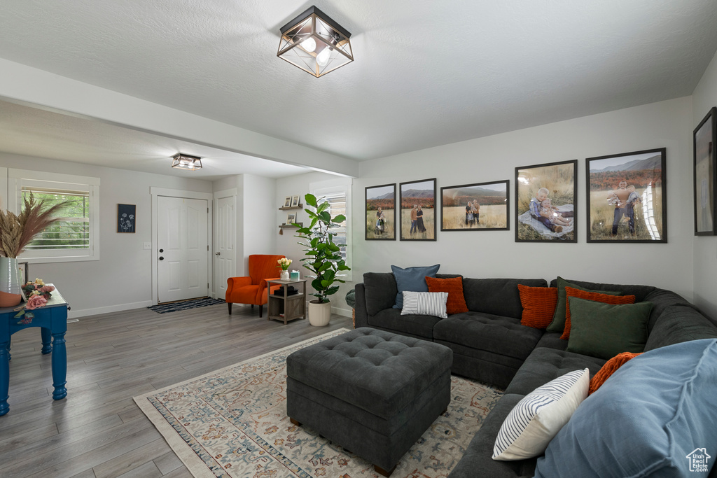 Living area featuring wood finished floors and baseboards