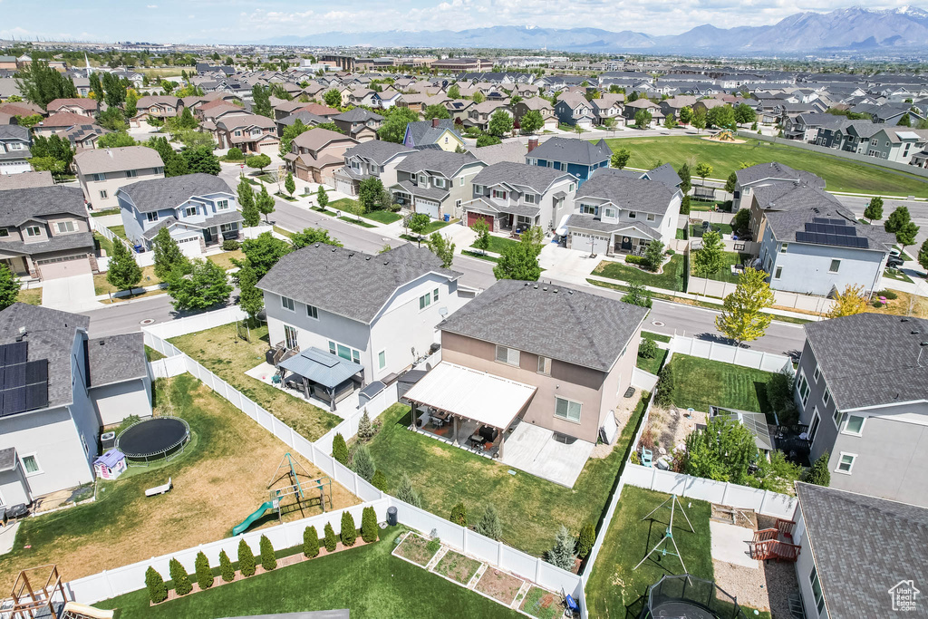 Aerial view of residential area with a mountain backdrop