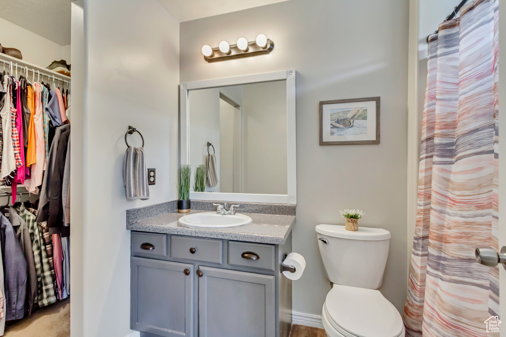 Bathroom with vanity and toilet