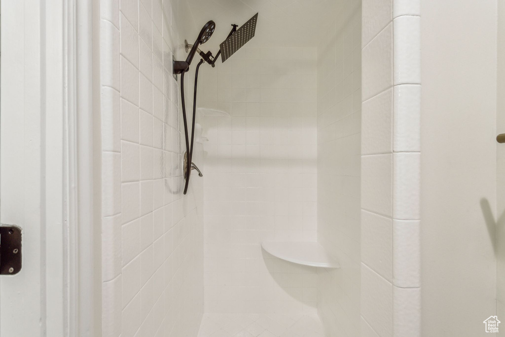 Bathroom view of a tile shower
