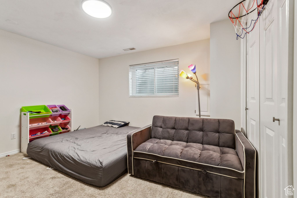 View of carpeted bedroom
