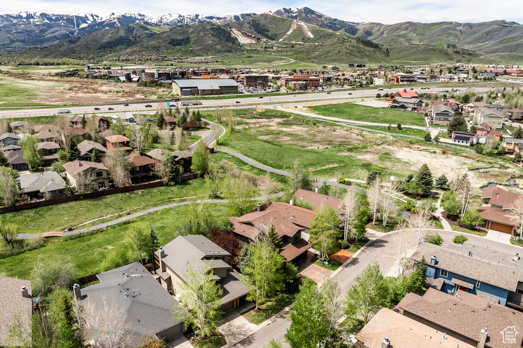 View of property location with nearby suburban area and mountains