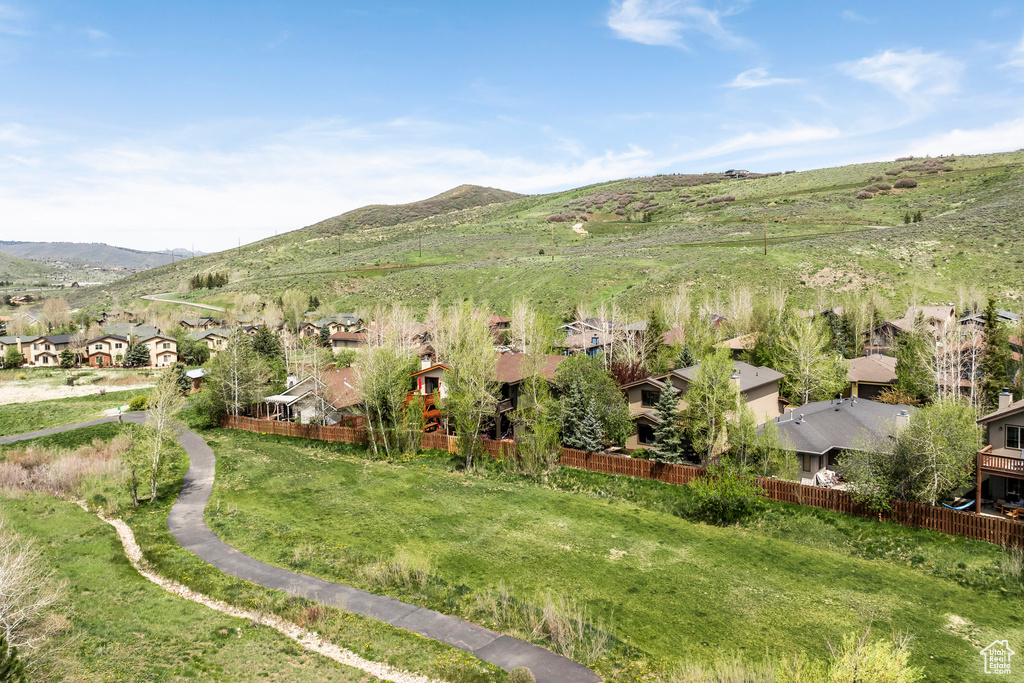 View of mountain backdrop with nearby suburban area