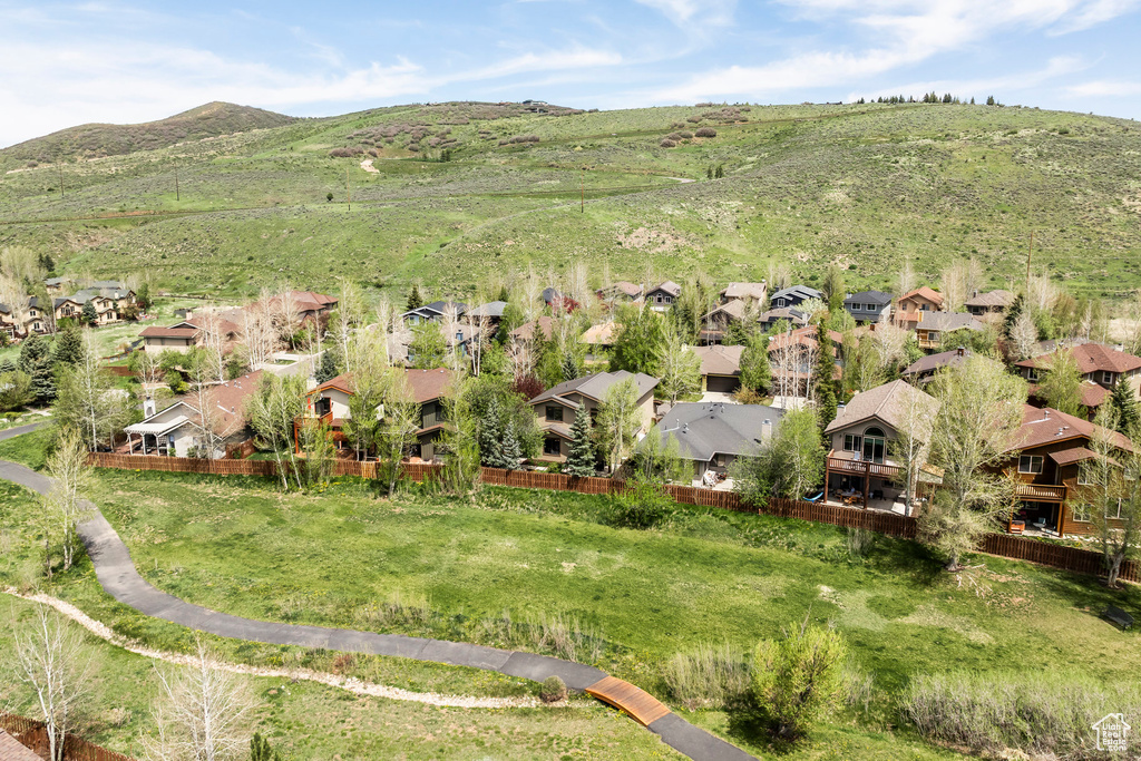 Aerial view of residential area with a mountainous background