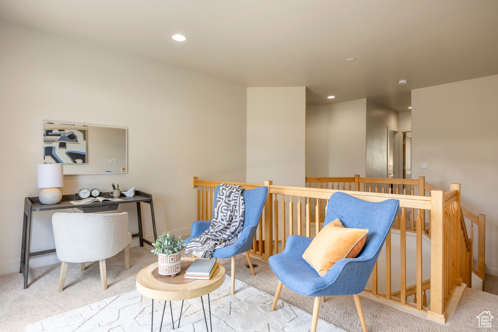 Sitting room with an upstairs landing, carpet floors, an office area, and recessed lighting