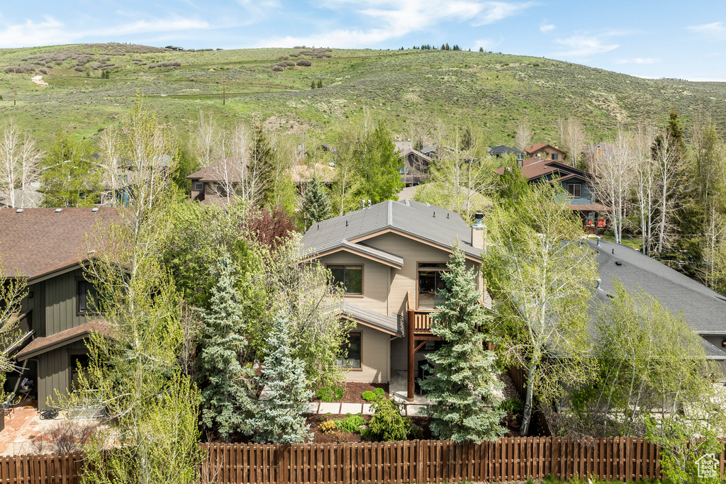View of subject property featuring mountains