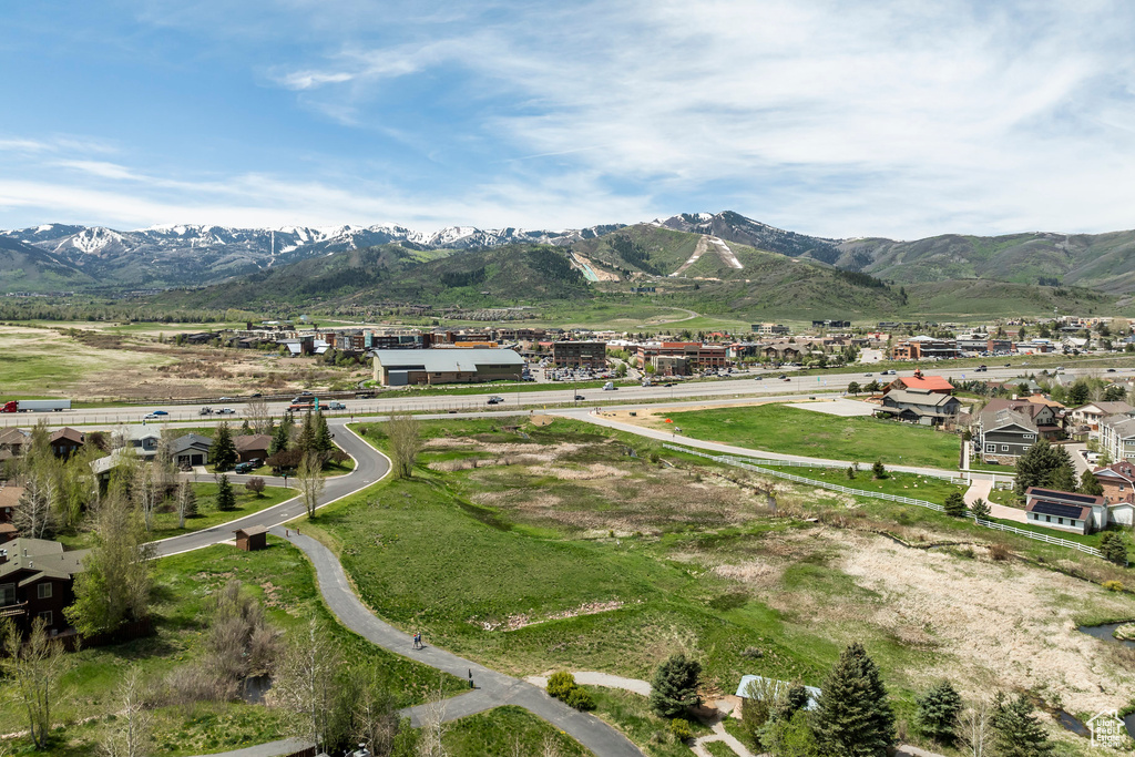 View of mountain backdrop with nearby suburban area