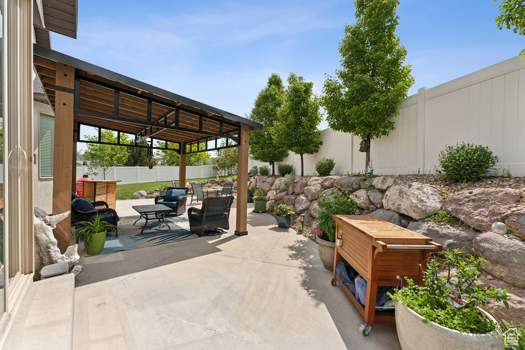 View of patio / terrace with a fenced backyard and an outdoor hangout area
