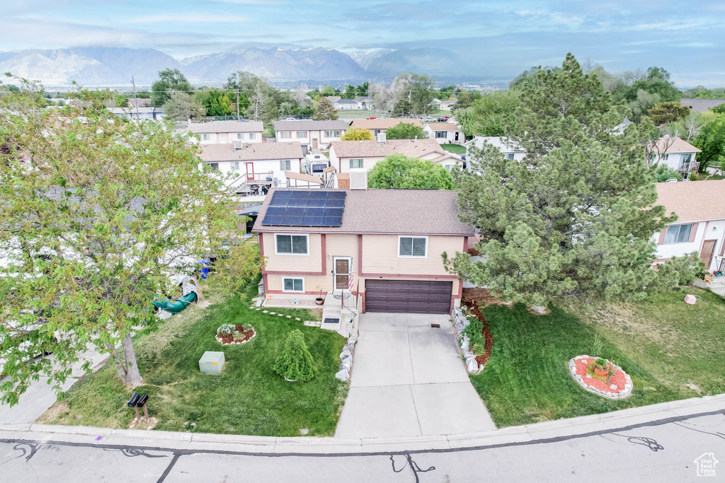 Aerial view of residential area with mountains