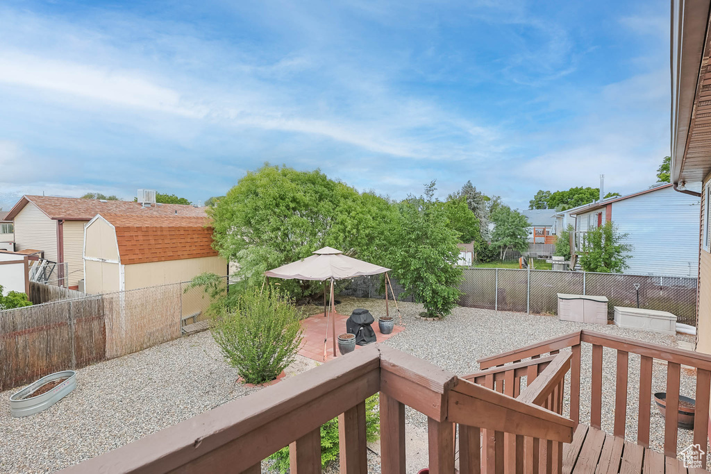 Fenced backyard featuring a patio