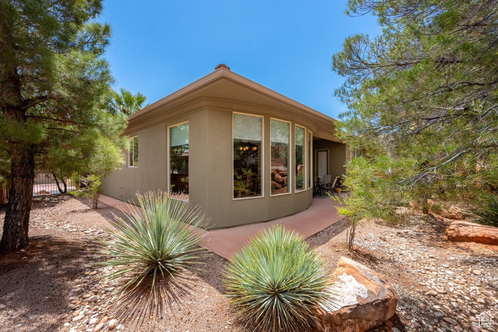 View of home's exterior with stucco siding