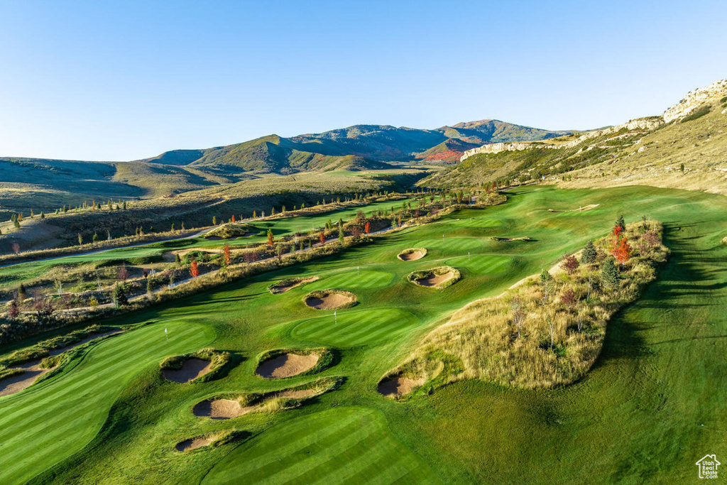 View of mountain background with a golf course