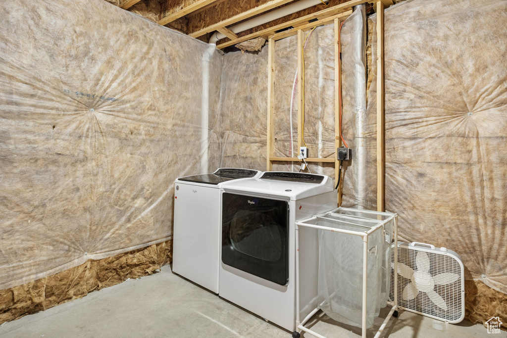 Laundry room featuring separate washer and dryer