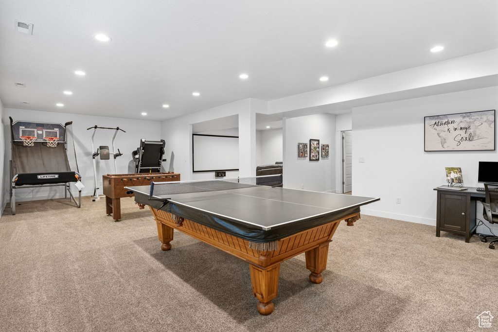 Playroom featuring light carpet, recessed lighting, and baseboards