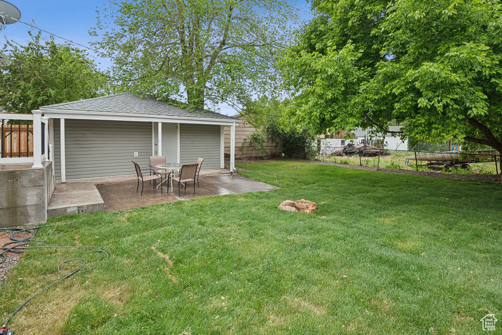 View of yard featuring a patio