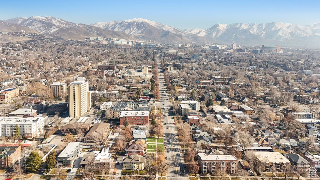Mountain view featuring nearby urban area