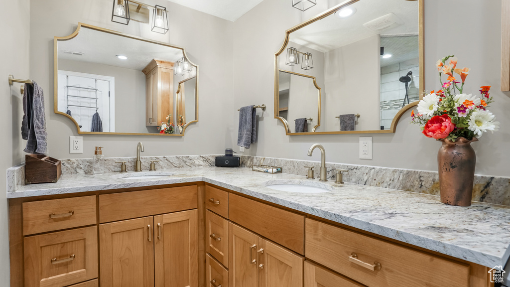 Bathroom featuring double vanity