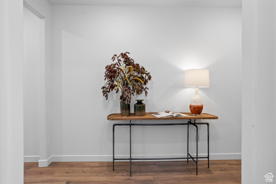 Detailed view of baseboards and wood finished floors